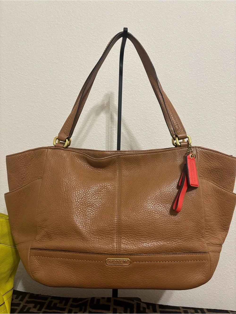Coach Brown Pebbled Leather Tote with Red Charm